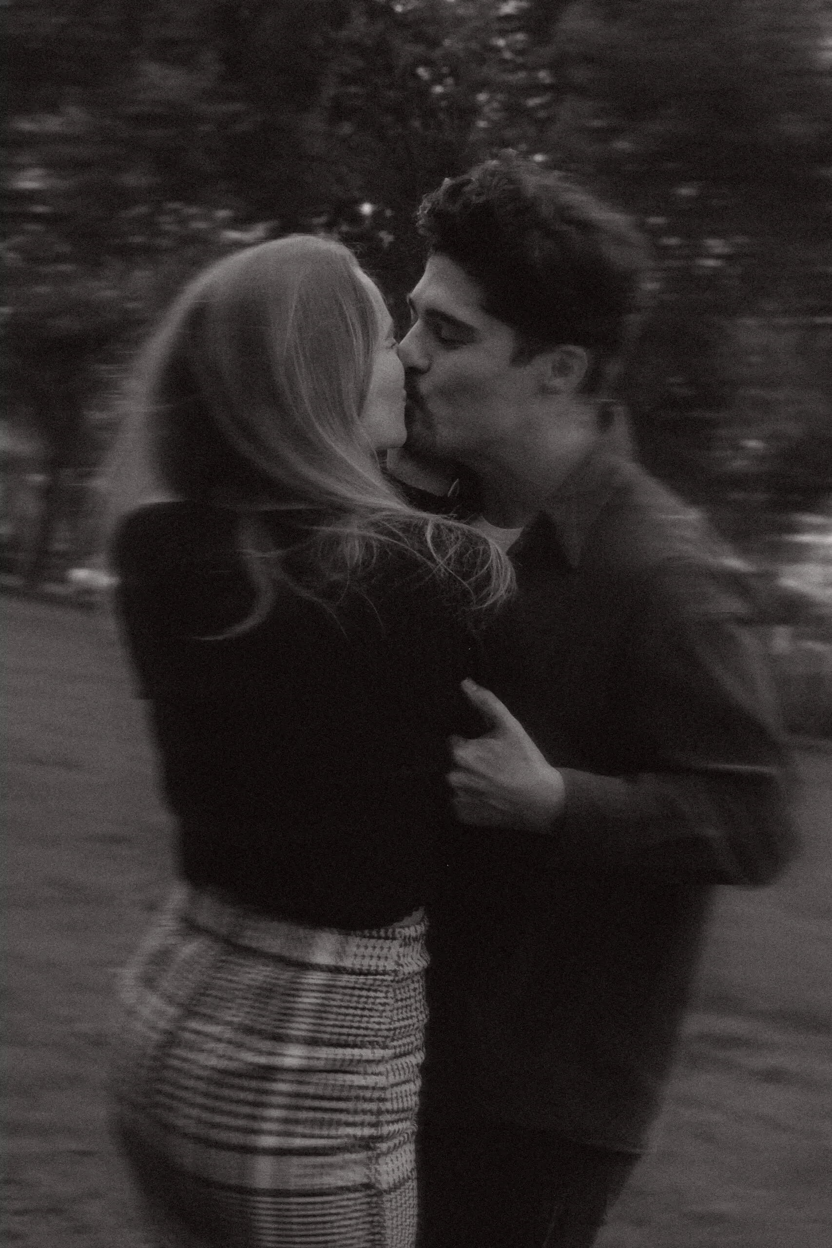 BW couple's portrait with movement in Amsterdam